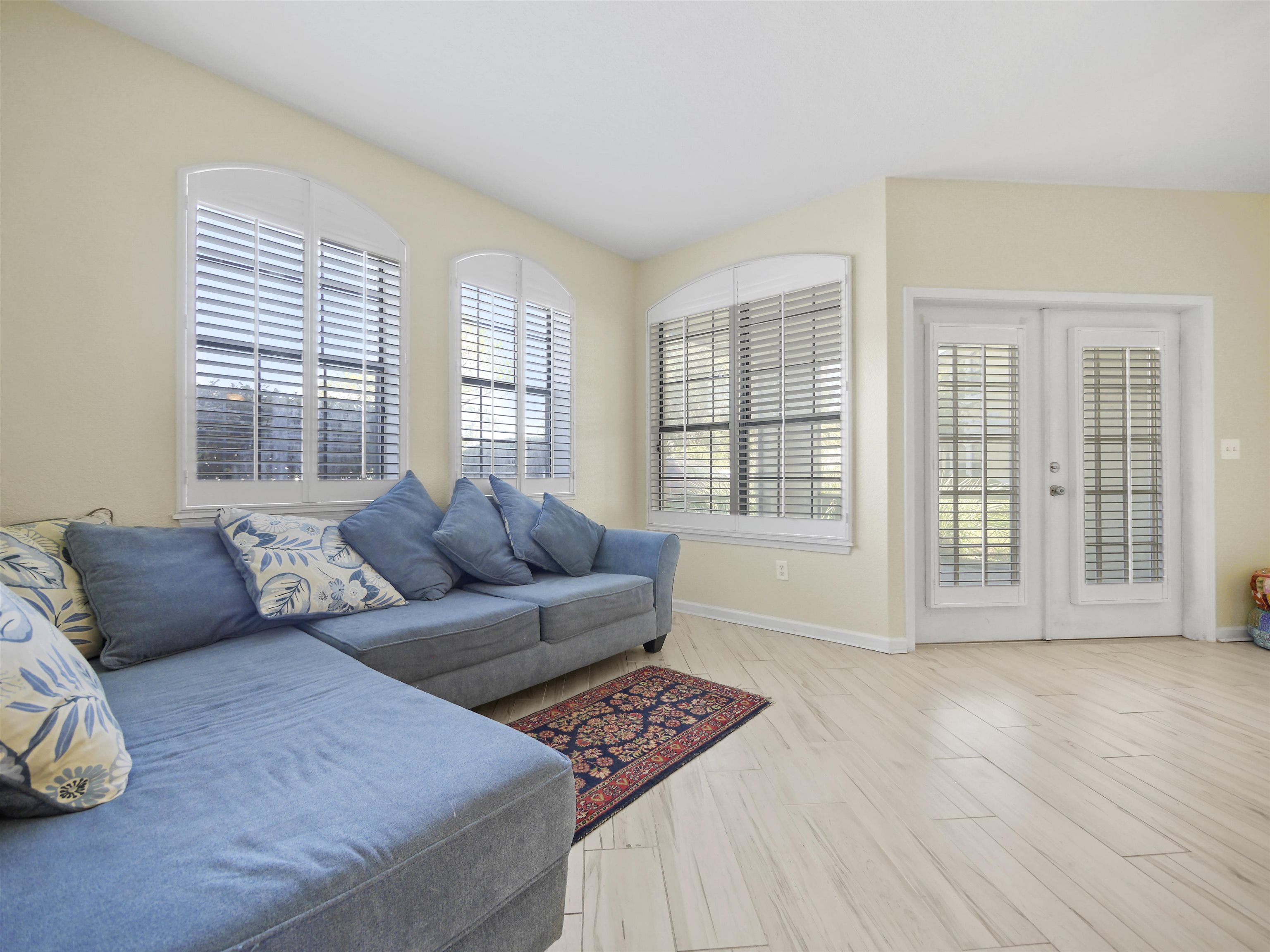 2200 Vista Cove Road St. Augustine, FL 32084 - Photo 11 of 44 a living room with furniture and a window