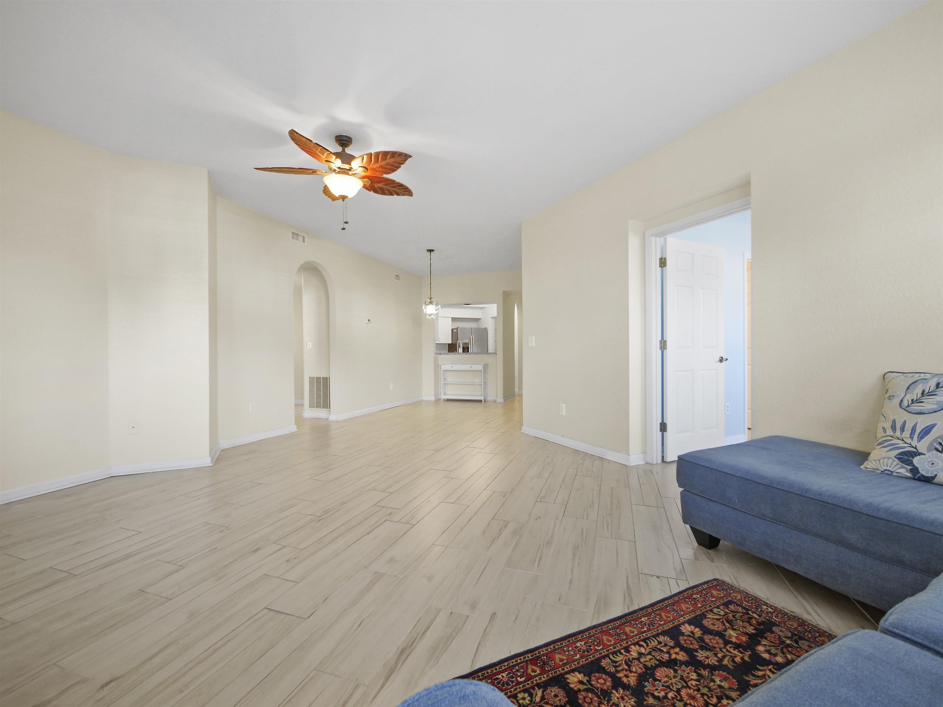 2200 Vista Cove Road St. Augustine, FL 32084 - Photo 12 of 44 a bedroom with furniture and a chandelier fan