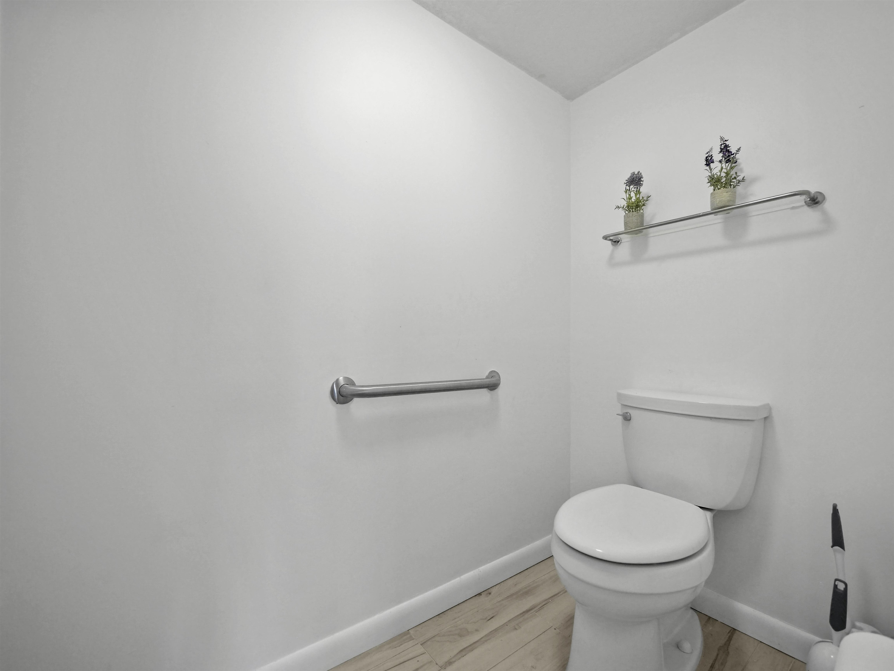 2200 Vista Cove Road St. Augustine, FL 32084 - Photo 18 of 44 a bathroom with a toilet and a sink