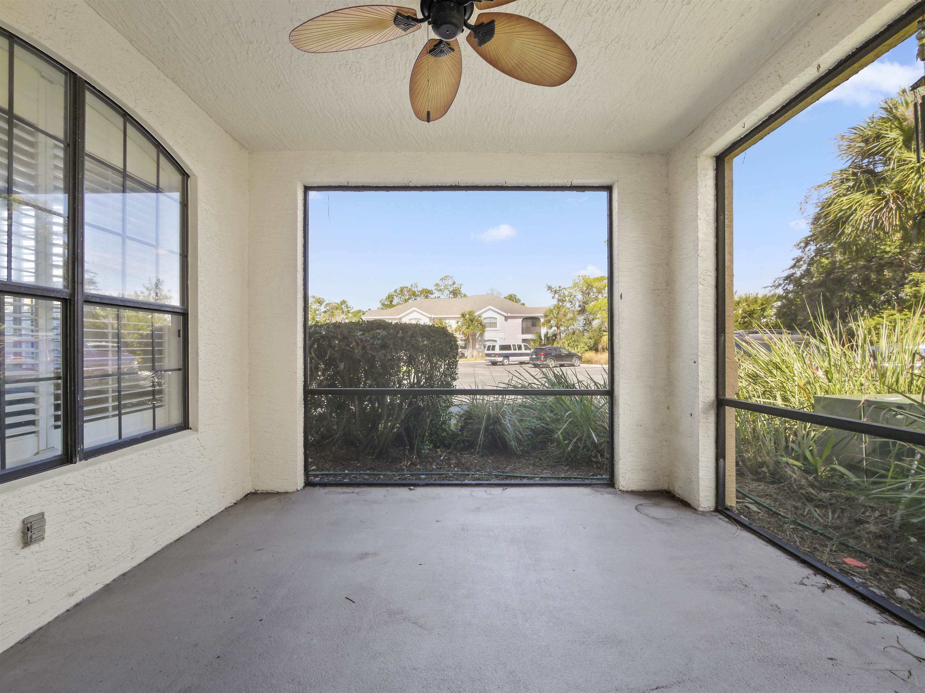 2200 Vista Cove Road St. Augustine, FL 32084 - Photo 28 of 44 a view of a room with a floor to ceiling window and a rug