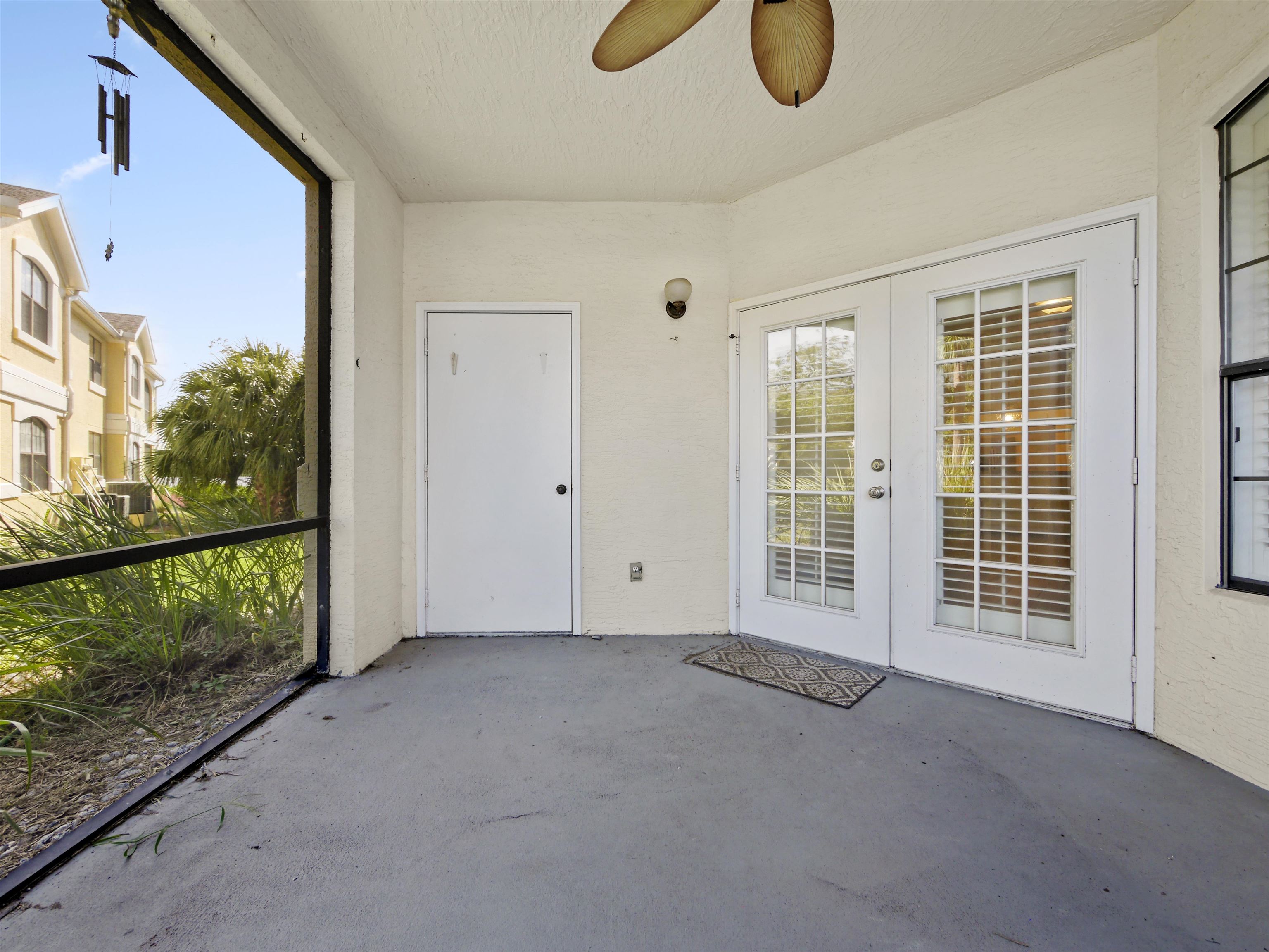 2200 Vista Cove Road St. Augustine, FL 32084 - Photo 29 of 44 a view of a livingroom with furniture and floor to ceiling window