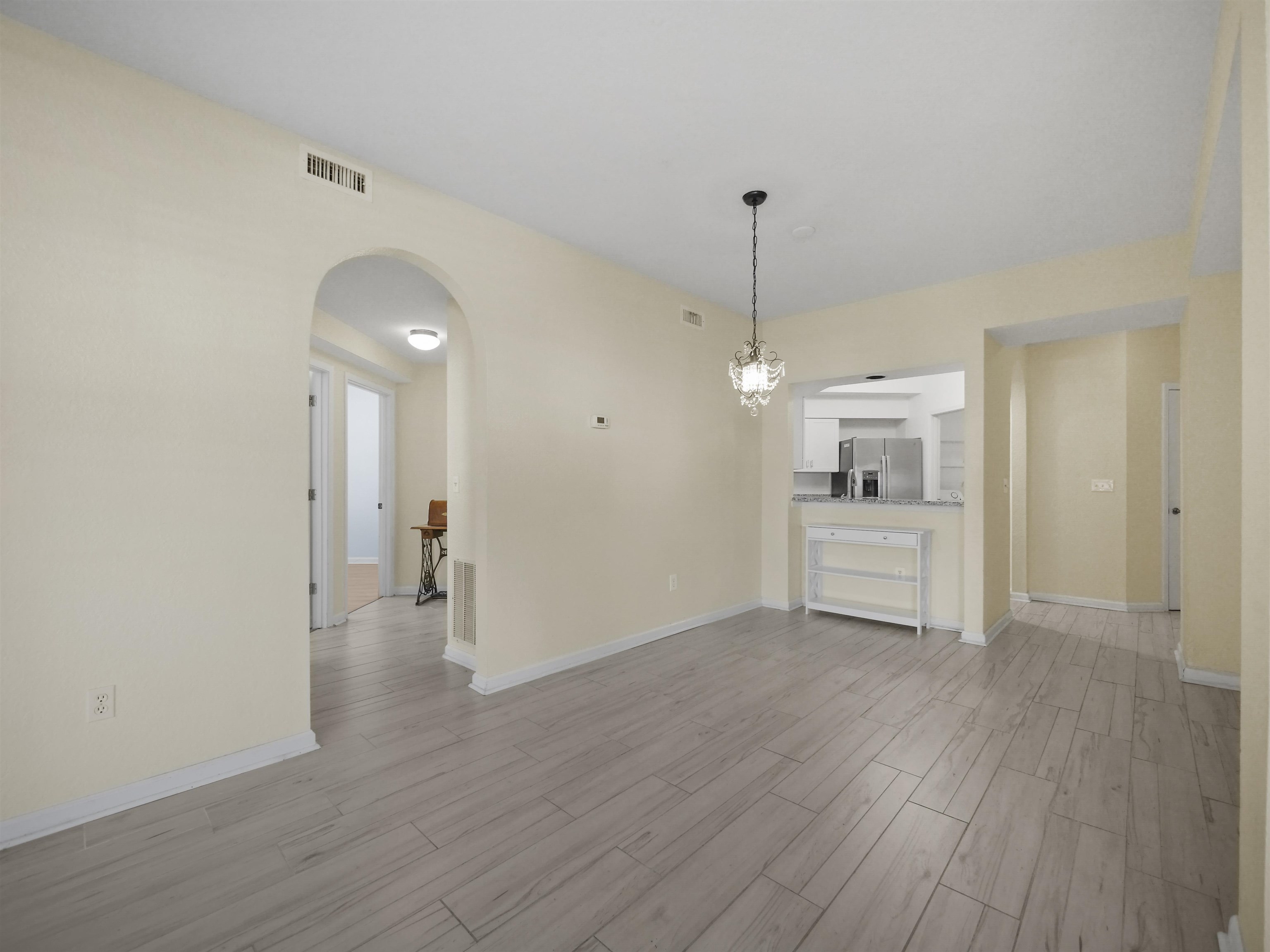 2200 Vista Cove Road St. Augustine, FL 32084 - Photo 8 of 44 a view of a kitchen cabinets and wooden floor