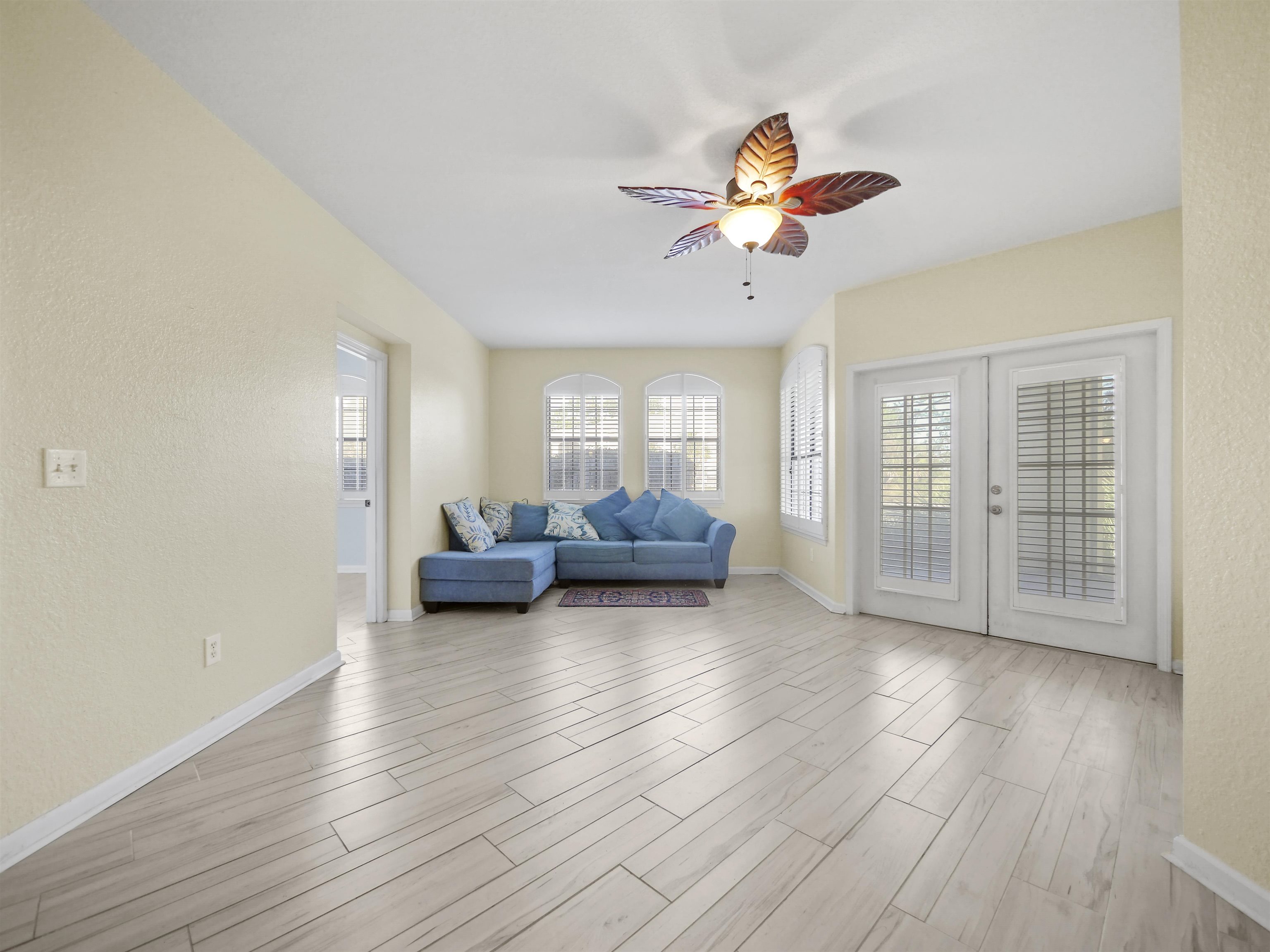 2200 Vista Cove Road St. Augustine, FL 32084 - Photo 10 of 44 a living room with furniture and a window