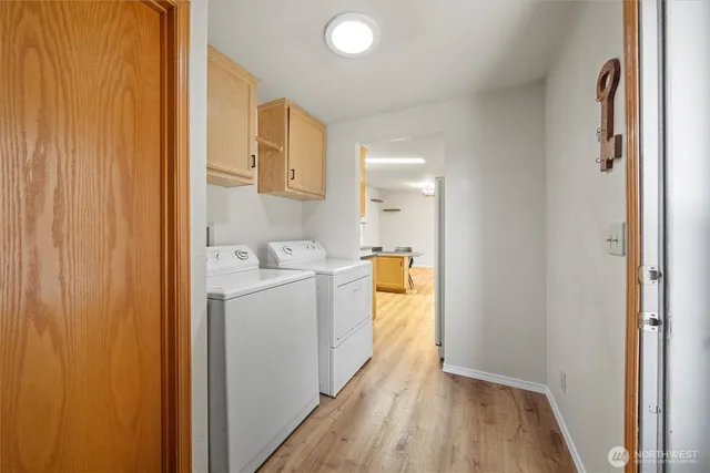 a view of a kitchen from the hallway