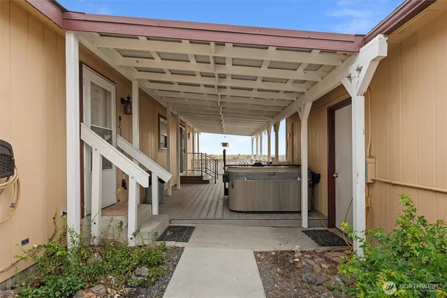 a view of a porch with seating space