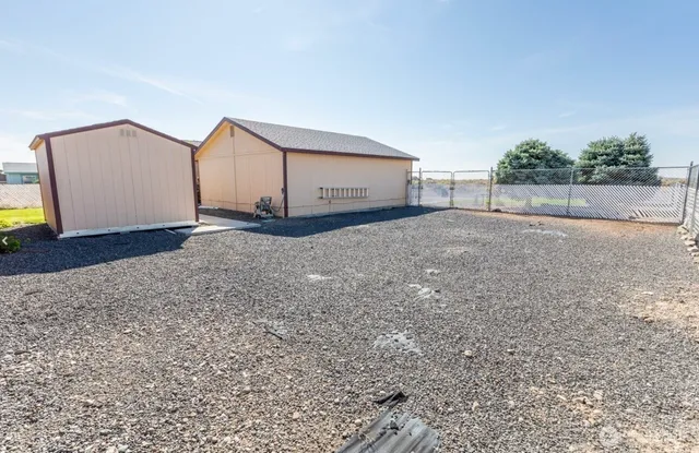 a view of a house with a swimming pool