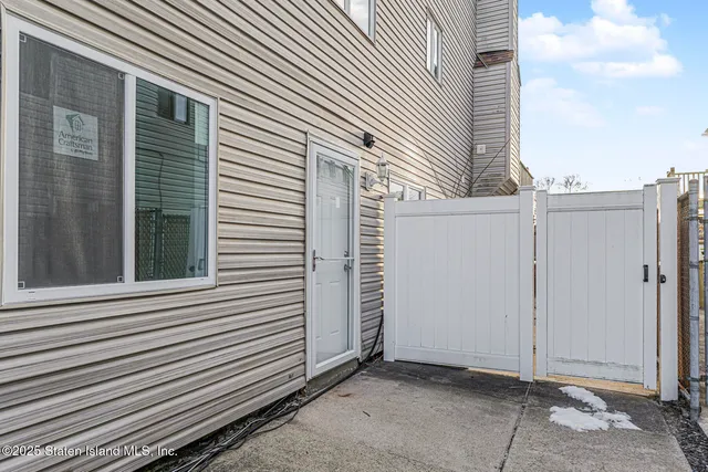 a view of a house with a white door