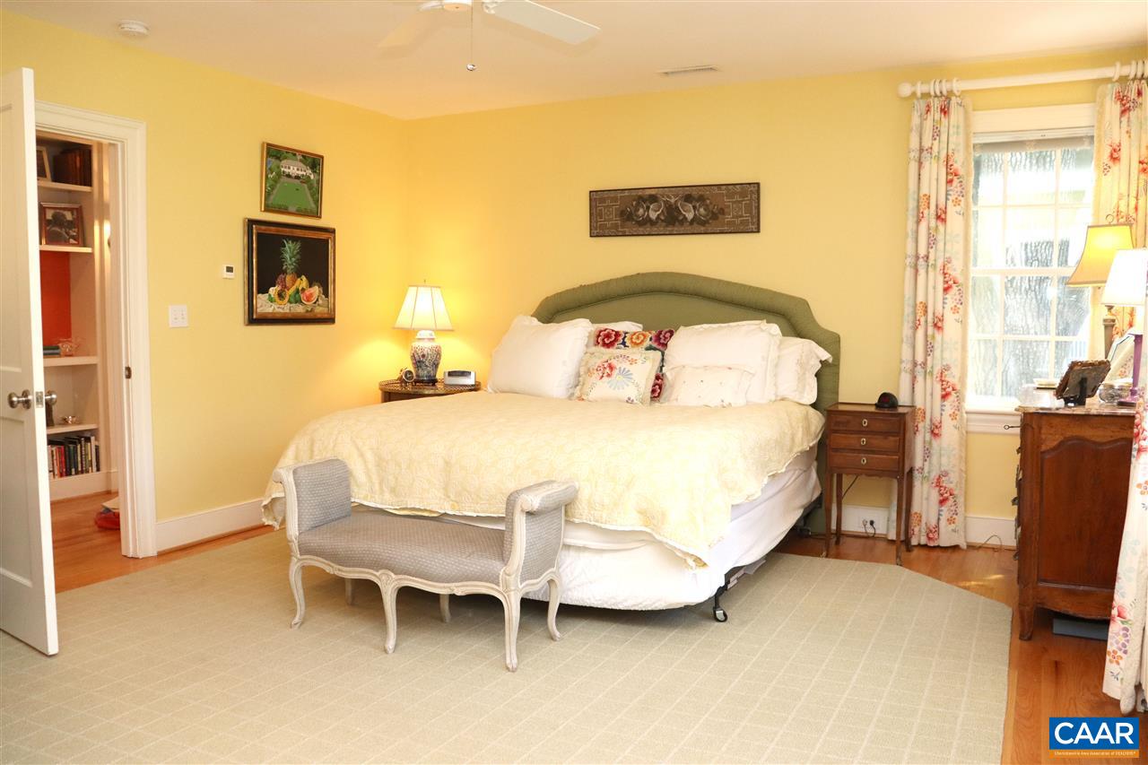 16 Canterbury Road Charlottesville, VA 22903 - Photo 19 of 37 a bedroom with a bed and a television