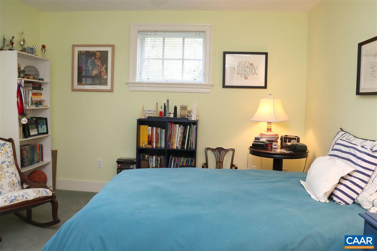 16 Canterbury Road Charlottesville, VA 22903 - Photo 29 of 37 a bedroom with furniture and a bed