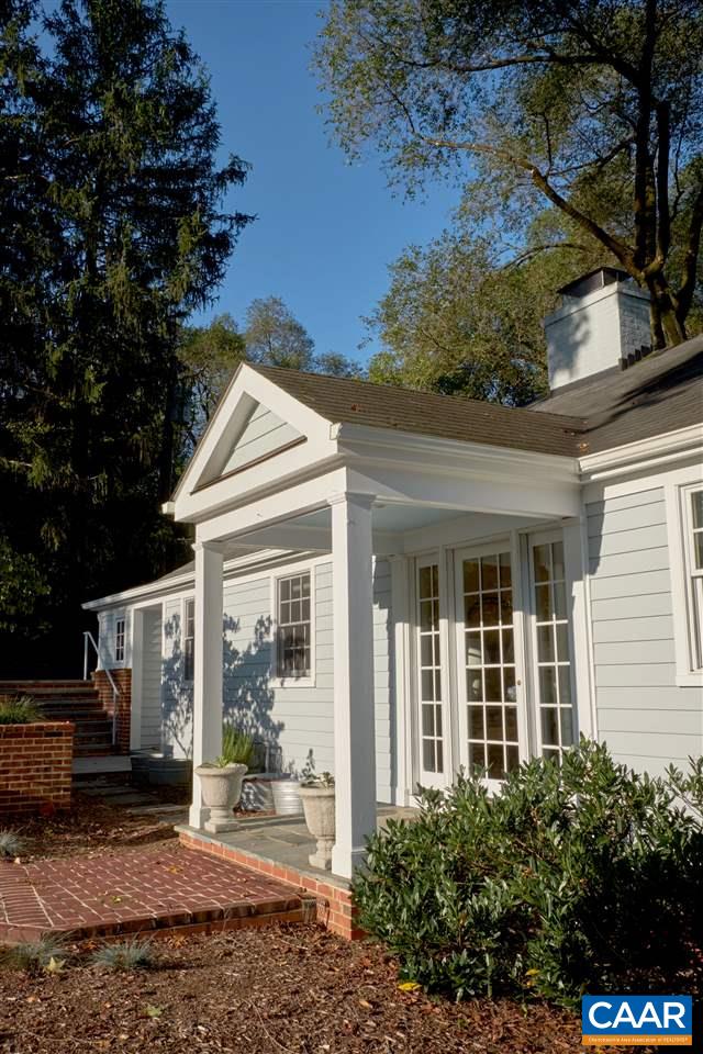 16 Canterbury Road Charlottesville, VA 22903 - Photo 3 of 37 a view of a house with a small yard and potted plants