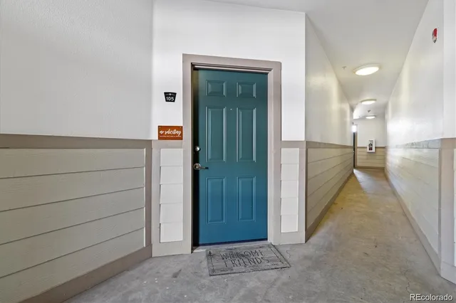 wooden floor with a bathroom