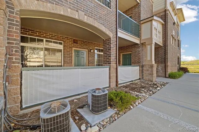 a front view of a house with a garage