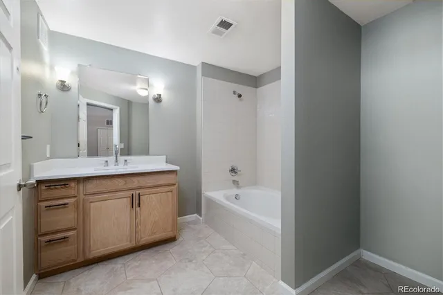 a bathroom with a sink and a bathtub