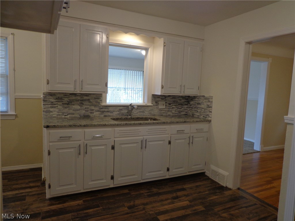 8305 Ackley Road Parma, OH 44129 - Photo 6 of 27 Kitchen cabinets