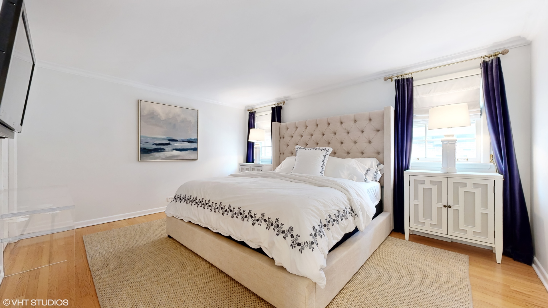 15 Winston Road Lake Forest, IL 60045 - Photo 14 of 26 a spacious bedroom with a bed and a flat screen tv
