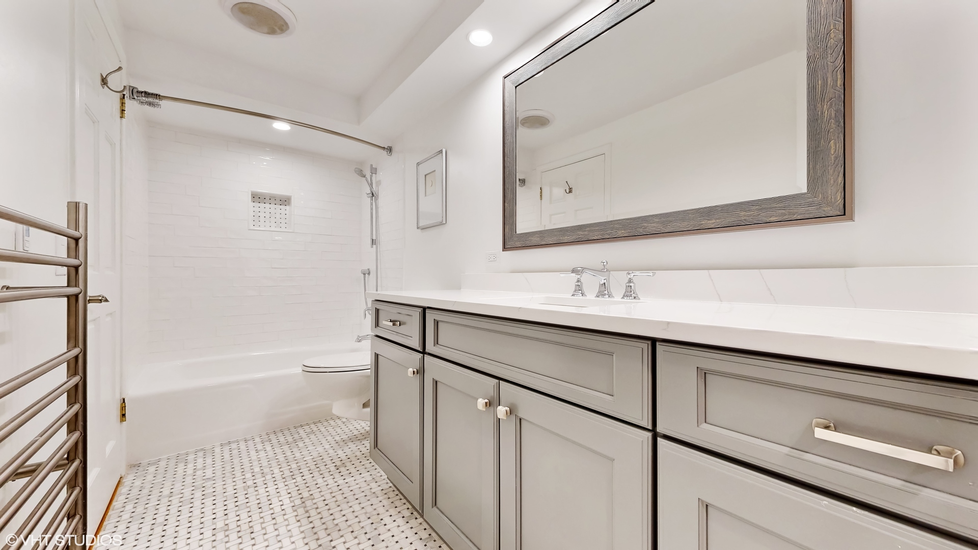 15 Winston Road Lake Forest, IL 60045 - Photo 15 of 26 a bathroom with a sink a toilet a shower and a mirror