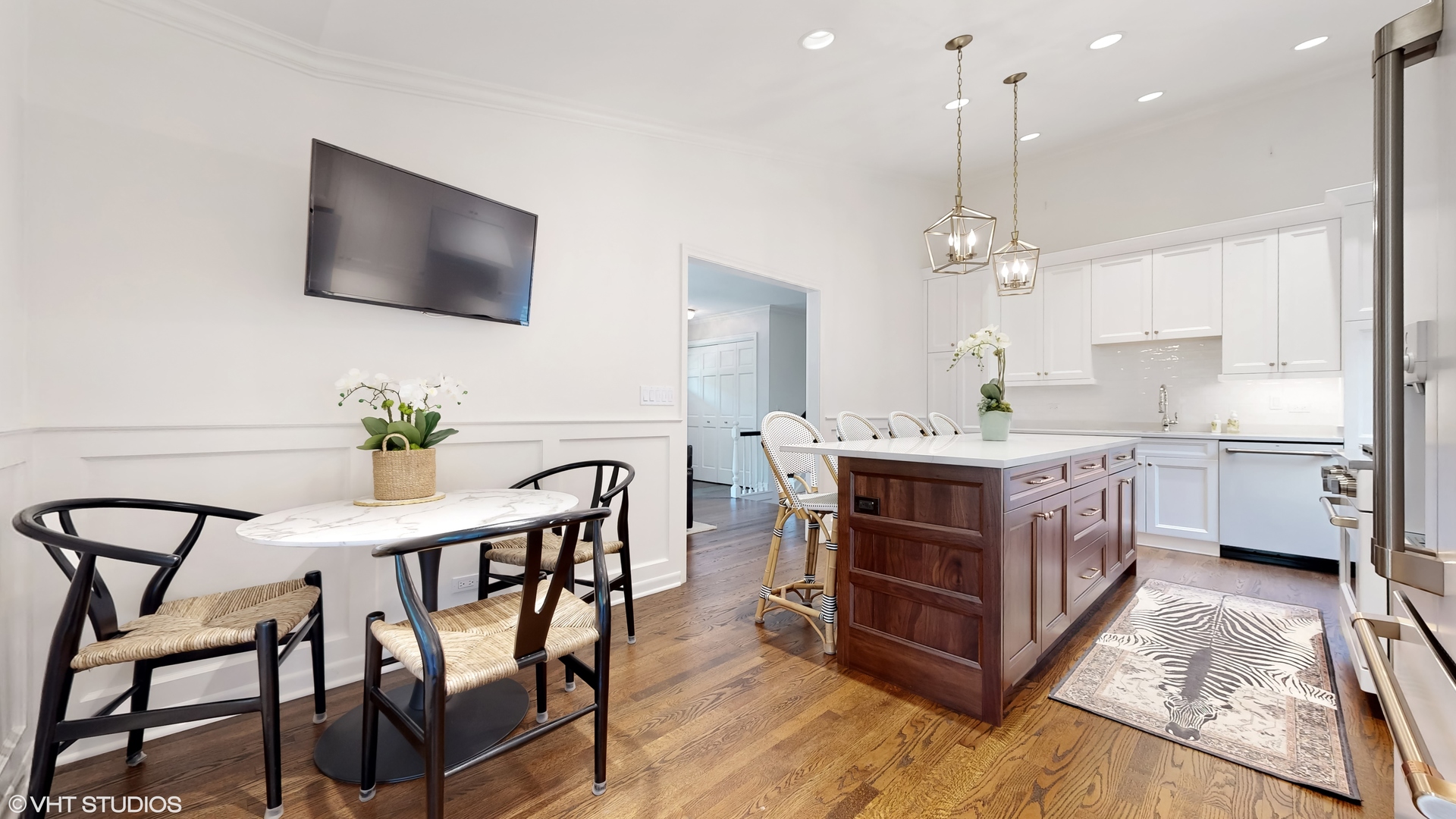 15 Winston Road Lake Forest, IL 60045 - Photo 8 of 26 a kitchen with a table chairs sink and cabinets