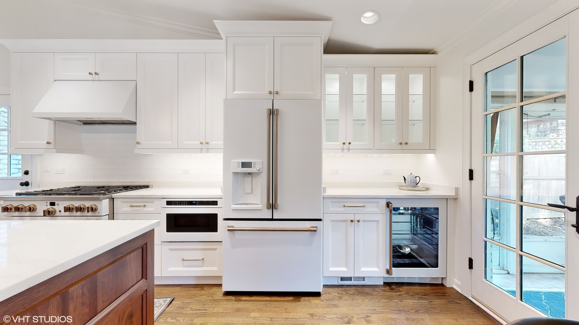 15 Winston Road Lake Forest, IL 60045 - Photo 9 of 26 a kitchen with stainless steel appliances a stove a refrigerator and a more cabinets