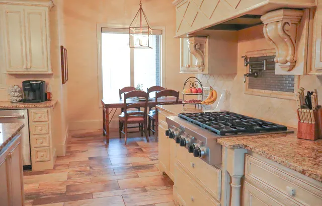 a bedroom with a bed and a mirror