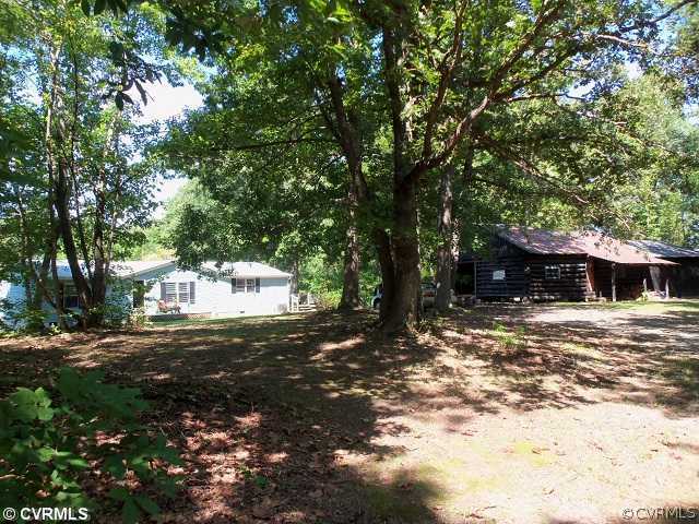 217 Jennings Road Cartersville, VA 23027 - Photo 1 of 12 Exterior Front - 6 acres with wonderful lake views