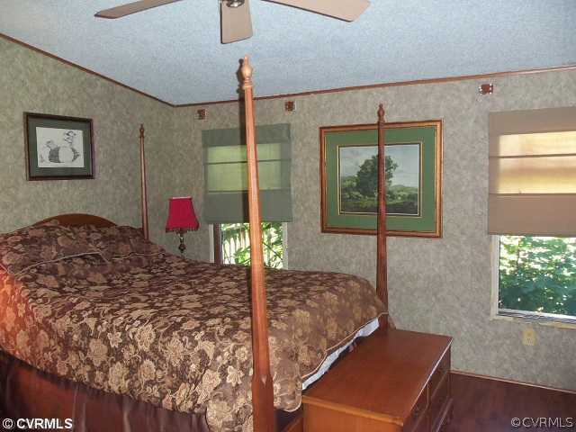 217 Jennings Road Cartersville, VA 23027 - Photo 8 of 12 Master Bedroom - Master suite with walk in closet