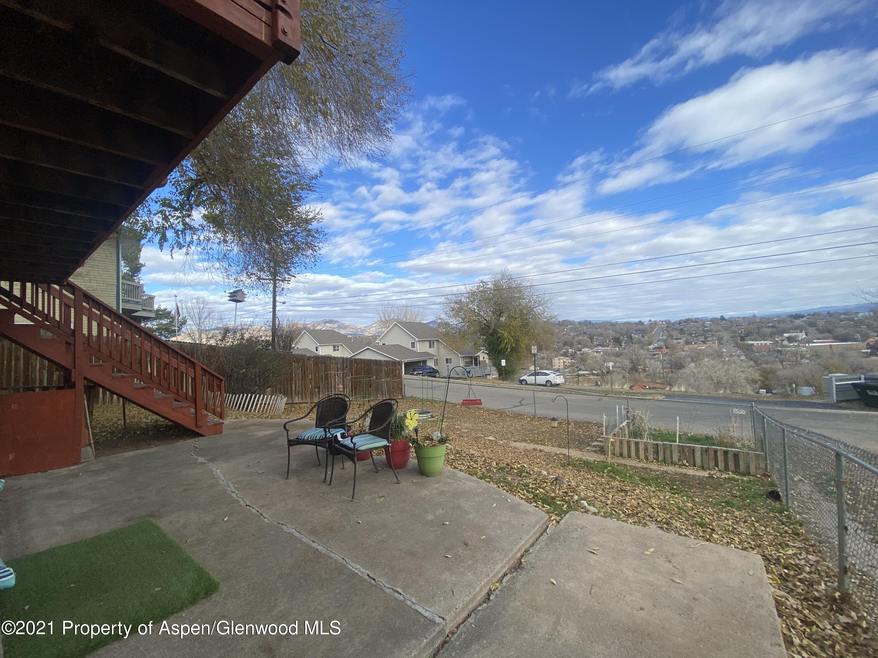 404 Hutton Avenue Rifle, CO 81650 - Photo 25 of 27 a view of a terrace with sitting area