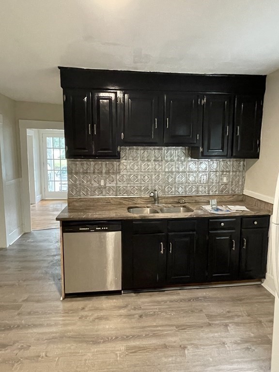 28 Carpenter Road Dudley, MA 01571 - Photo 2 of 6 a kitchen with a sink and cabinets