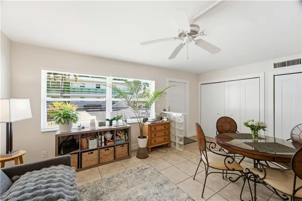 a room with furniture and a window