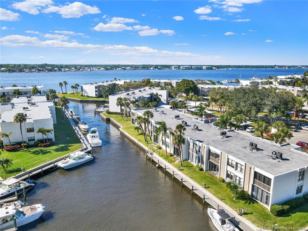 1950 Southwest Palm City Road, Unit 9102 Stuart, FL 34994 - Photo 2 of 51 a view of a city with tall buildings