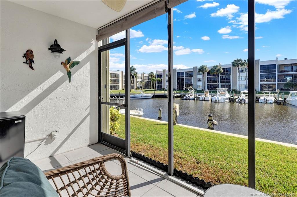 1950 Southwest Palm City Road, Unit 9102 Stuart, FL 34994 - Photo 22 of 51 a swimming pool view from a balcony
