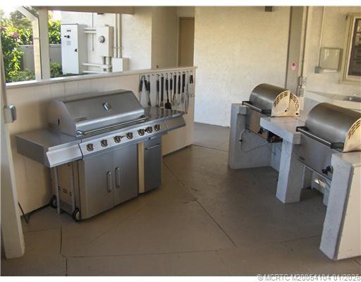 1950 Southwest Palm City Road, Unit 9102 Stuart, FL 34994 - Photo 44 of 51 a view of a kitchen with a sink