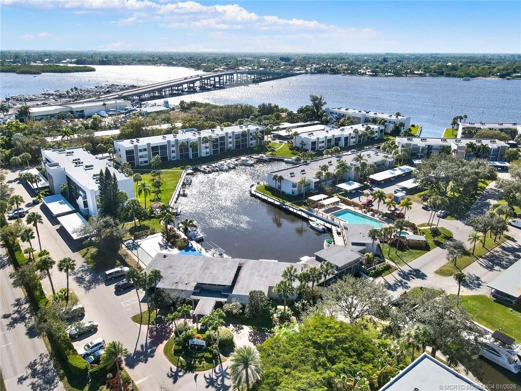 1950 Southwest Palm City Road, Unit 9102 Stuart, FL 34994 - Photo 48 of 51 an aerial view of residential houses with outdoor space