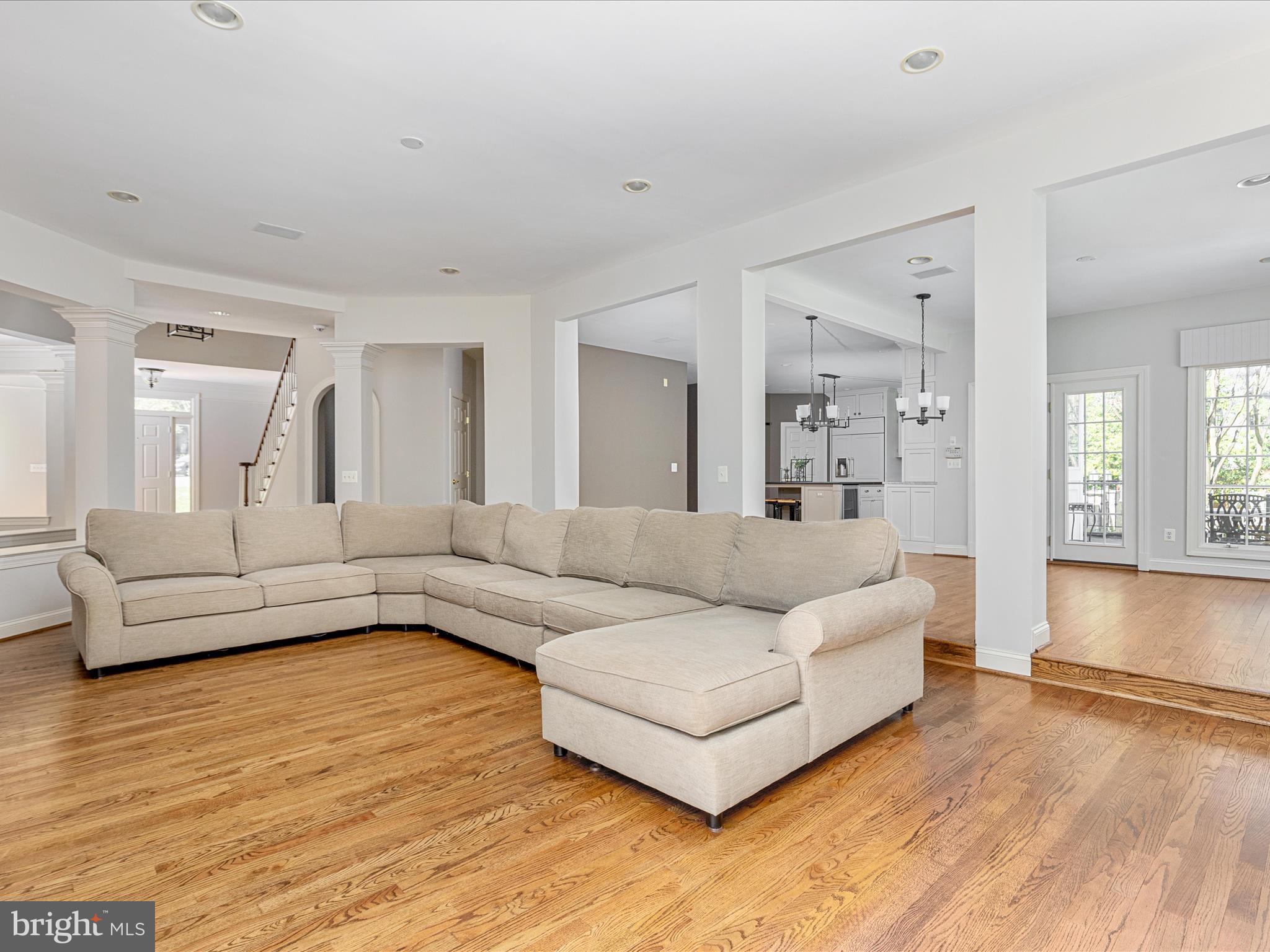 10554 Fox Forest Drive Great Falls, VA 22066 - Photo 15 of 77 a living room with furniture and a large window