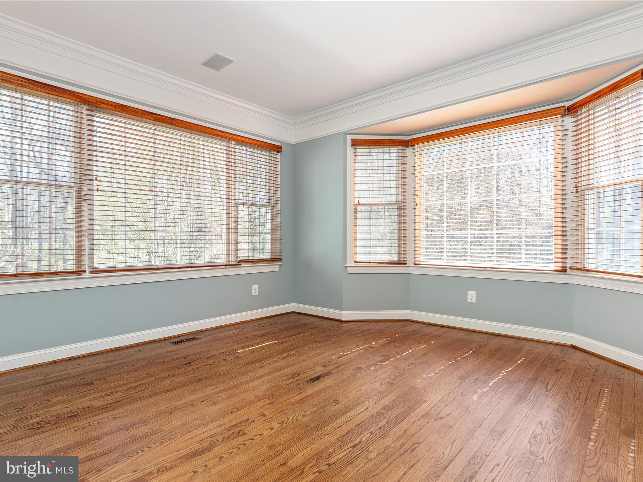 10554 Fox Forest Drive Great Falls, VA 22066 - Photo 22 of 77 a view of empty room with wooden floor and fan