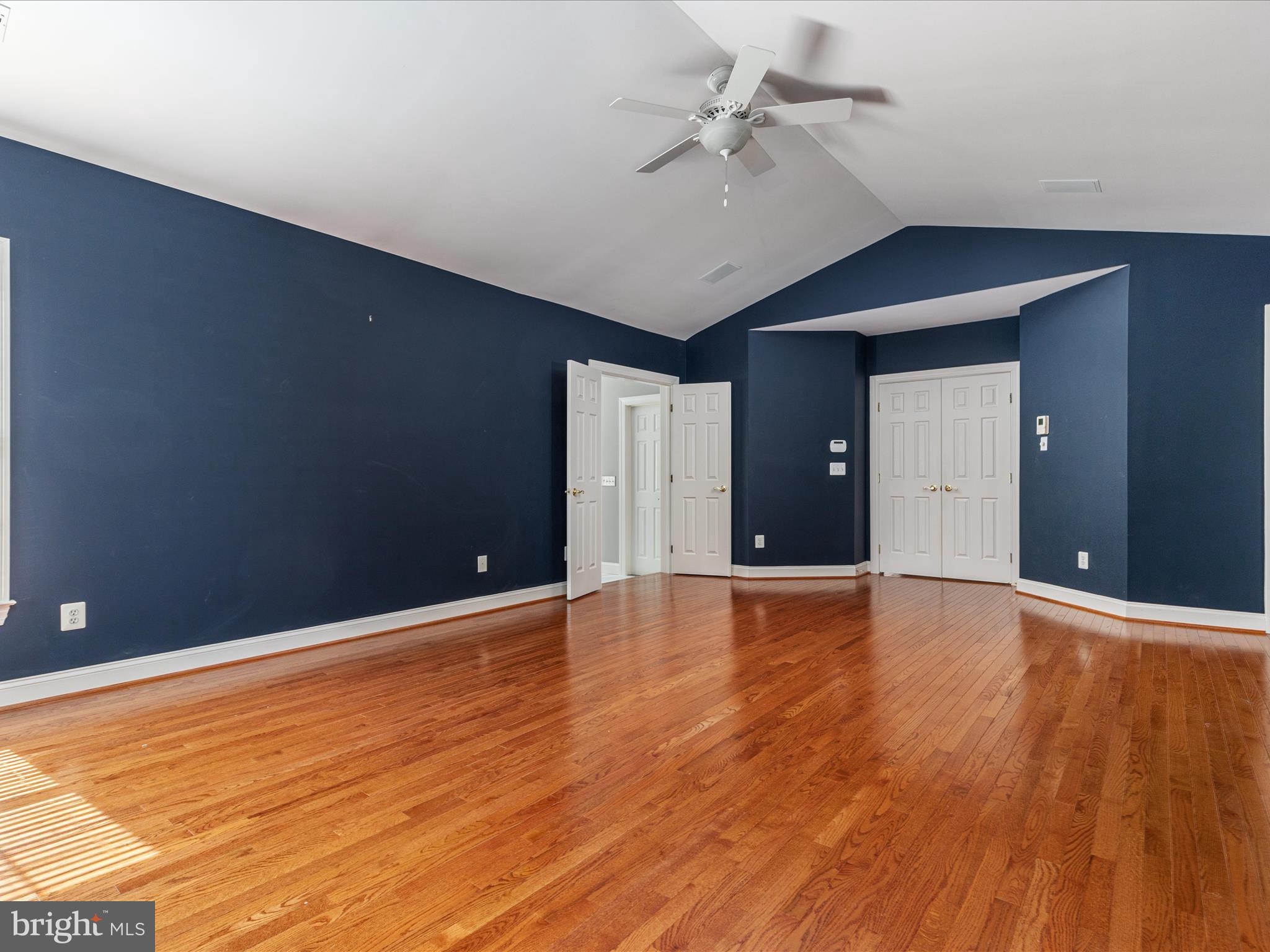 10554 Fox Forest Drive Great Falls, VA 22066 - Photo 26 of 77 a view of an empty room with wooden floor