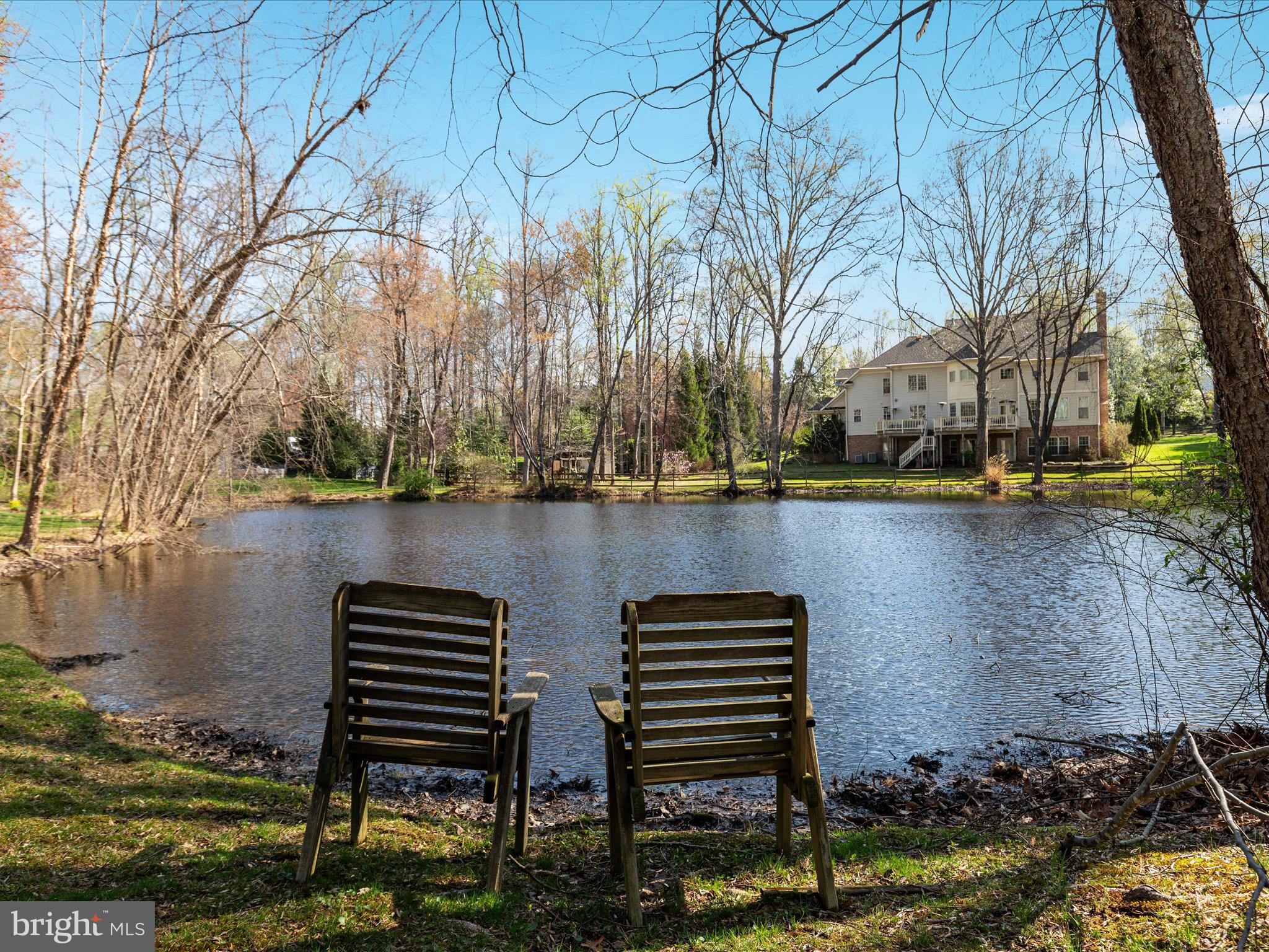 10554 Fox Forest Drive Great Falls, VA 22066 - Photo 68 of 77 Sparkling pond behind home (other side of fence)