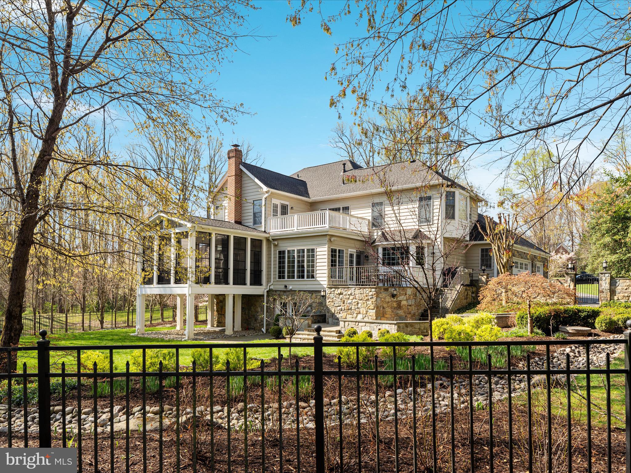 10554 Fox Forest Drive Great Falls, VA 22066 - Photo 69 of 77 a front view of a house with a garden