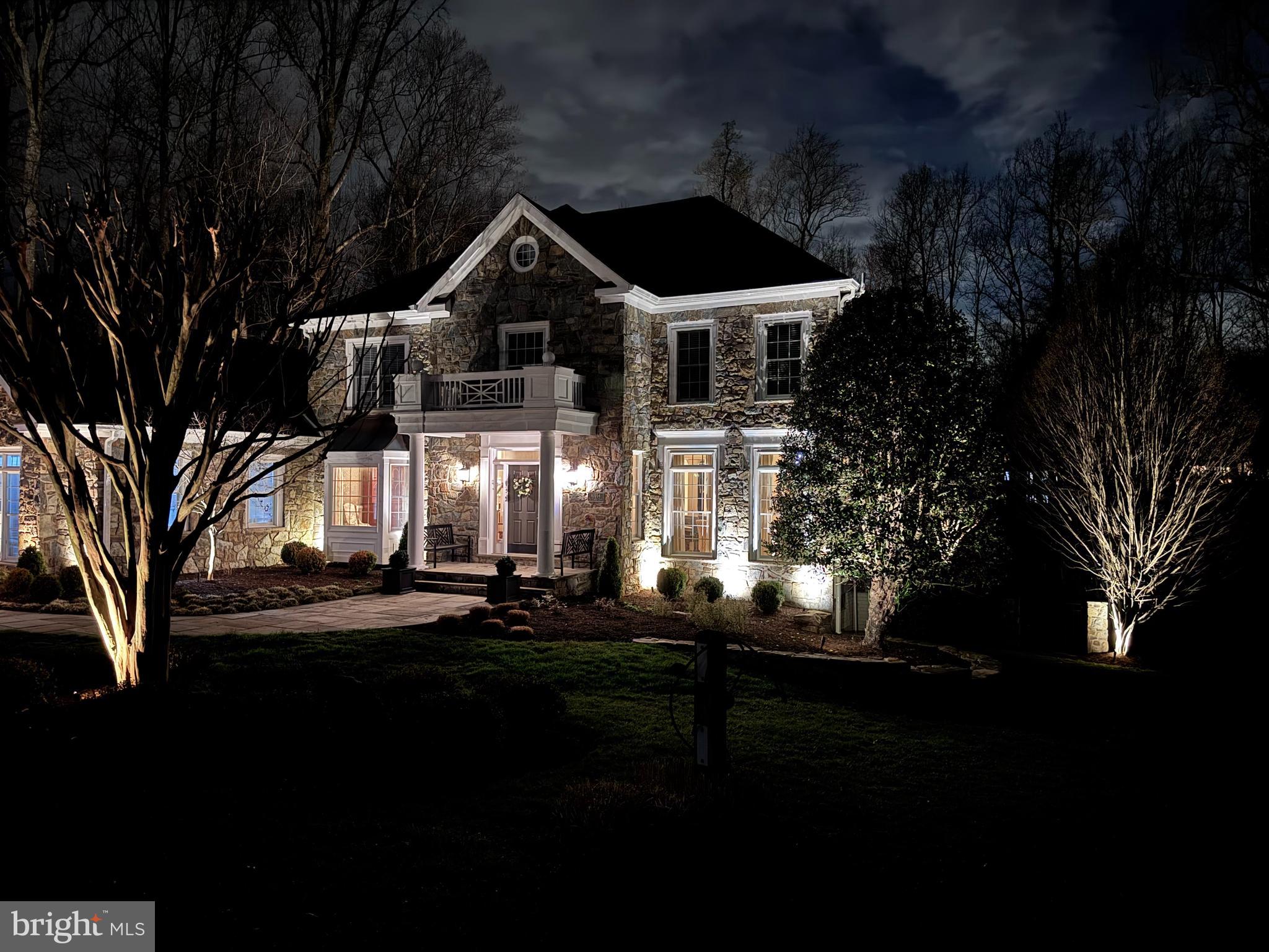 10554 Fox Forest Drive Great Falls, VA 22066 - Photo 70 of 77 a front view of a house with yard