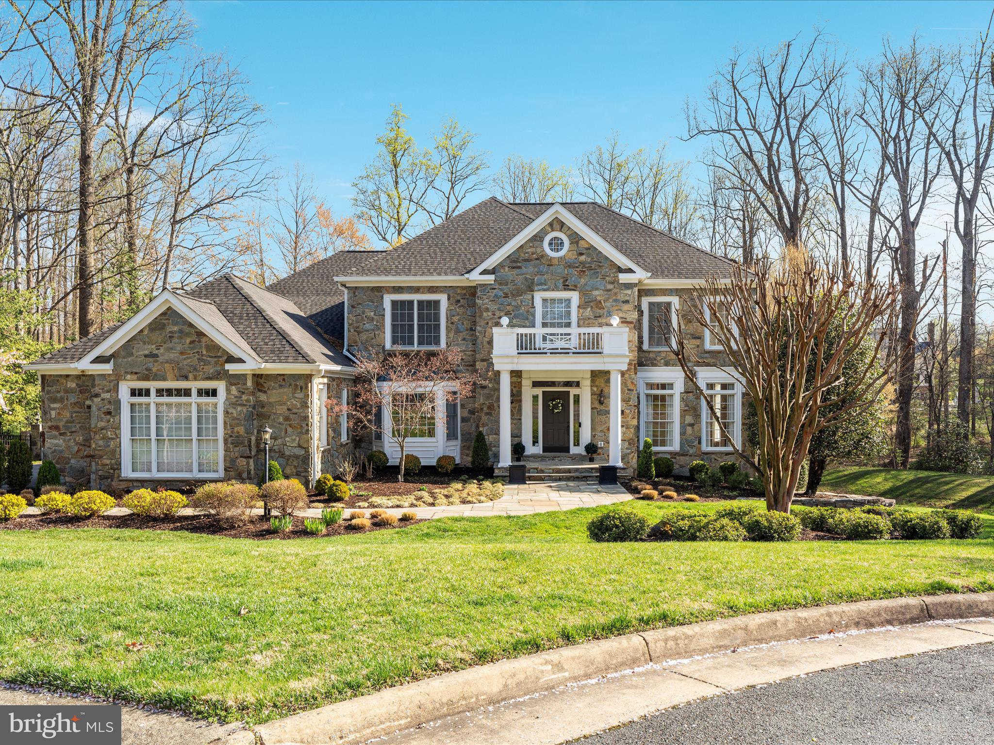 10554 Fox Forest Drive Great Falls, VA 22066 - Photo 73 of 77 front view of a house with a yard