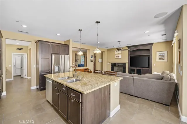a bedroom with furniture and a flat screen tv
