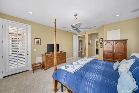 a bathroom with a sink toilet a mirror and shower
