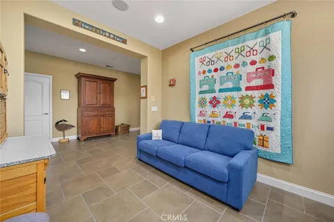 an aerial view of a house with garden space and ocean view