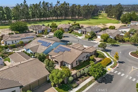 a view of a backyard with sitting area