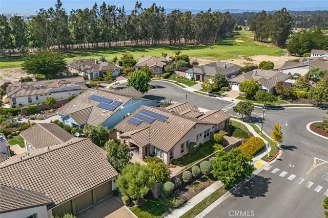 a view of a backyard with sitting area