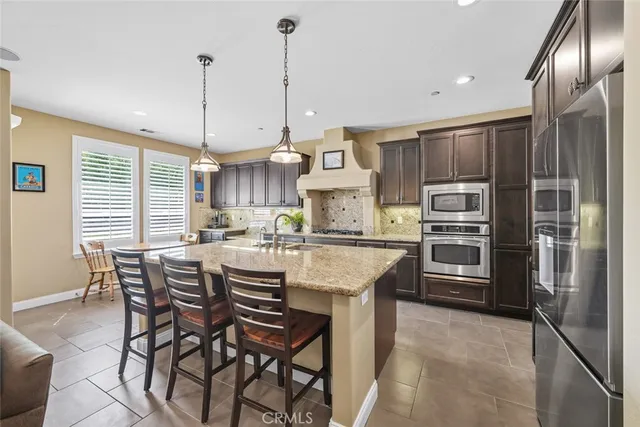 a outdoor living space with furniture and a potted plant
