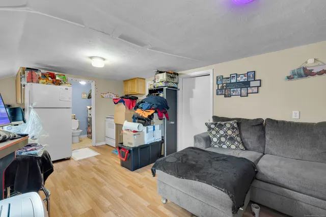 a living room with furniture and a couch
