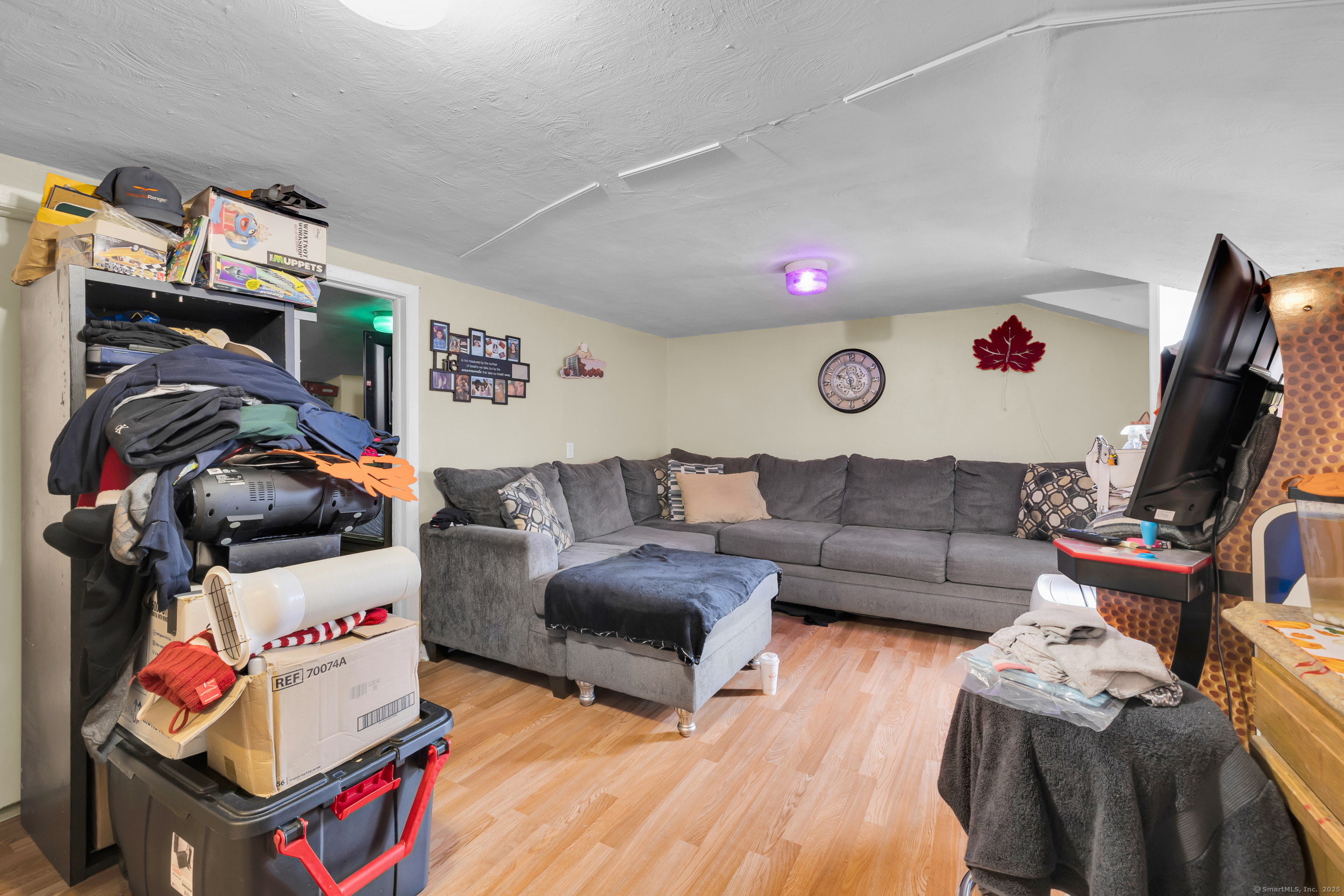 1259 Wolcott Road Wolcott, CT 06716 - Photo 12 of 30 a living room with furniture and a couch