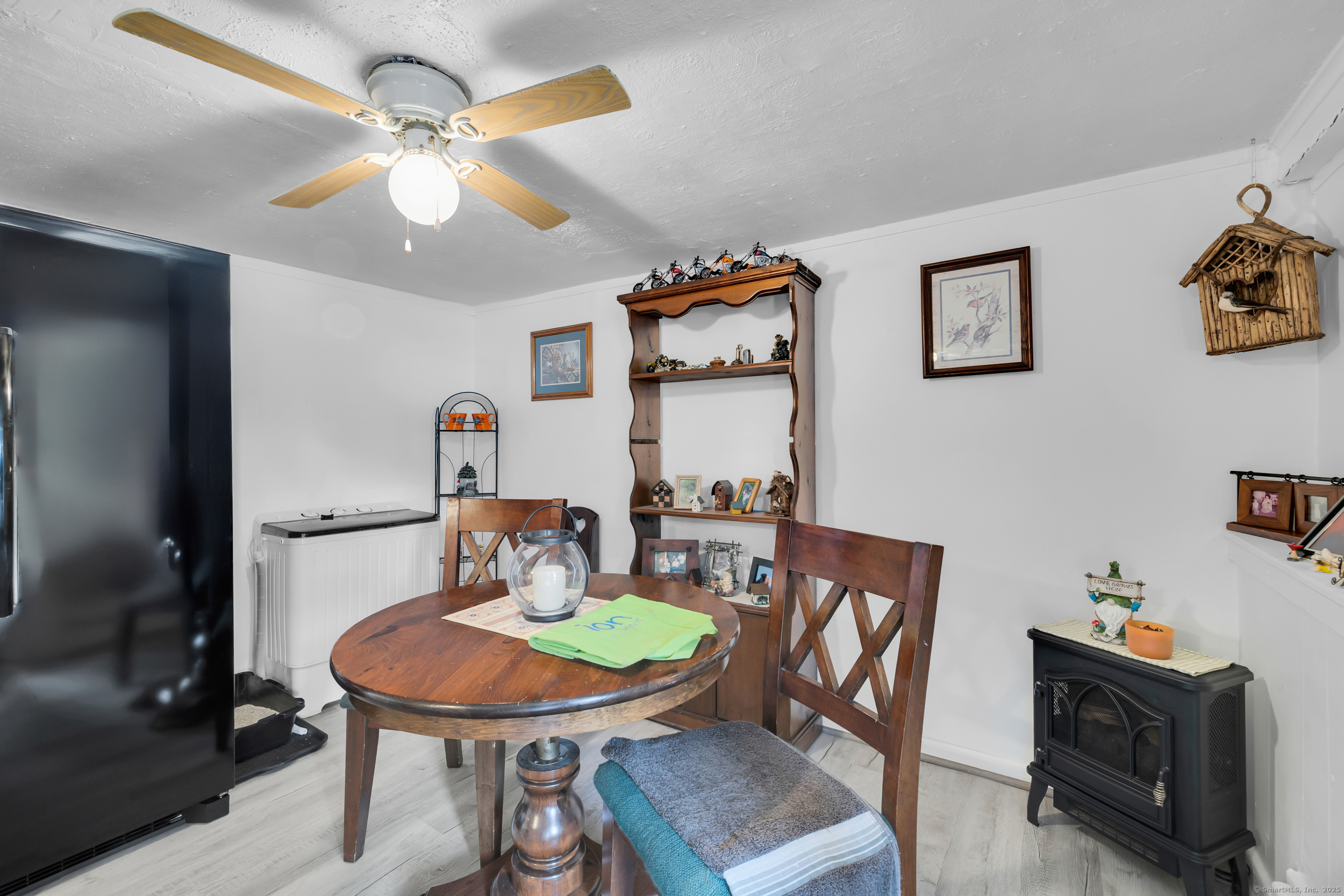 1259 Wolcott Road Wolcott, CT 06716 - Photo 20 of 30 a view of a dining room with furniture