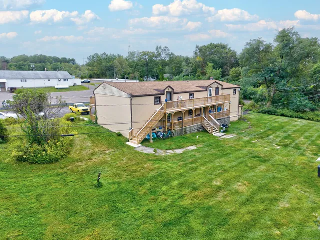 an aerial view of a house with garden