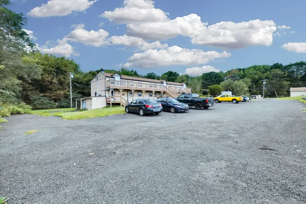 a car parked in front of a house
